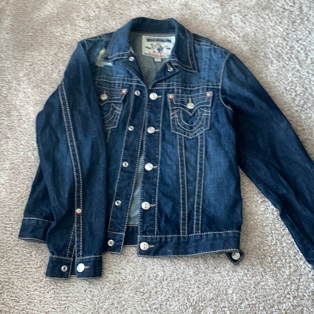 Dark blue jacket with a torn design